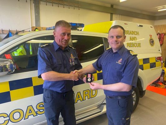 unst-coastguard-stalwart-given-long-service-medal-–-shetland-news