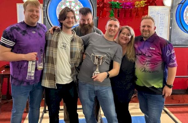darts-tournament-in-memory-of-loving-husband-and-father-checks-out-for-charity