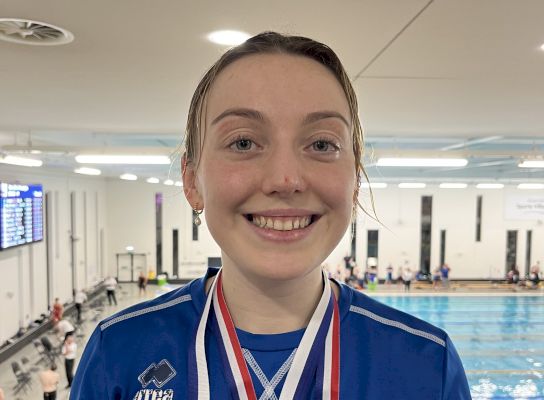 swimmer-celebrates-double-medal-victory-after-near-death-experience