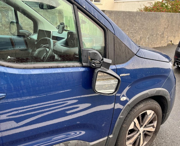 watch:-topless-vandal-caught-on-camera-damaging-vehicle