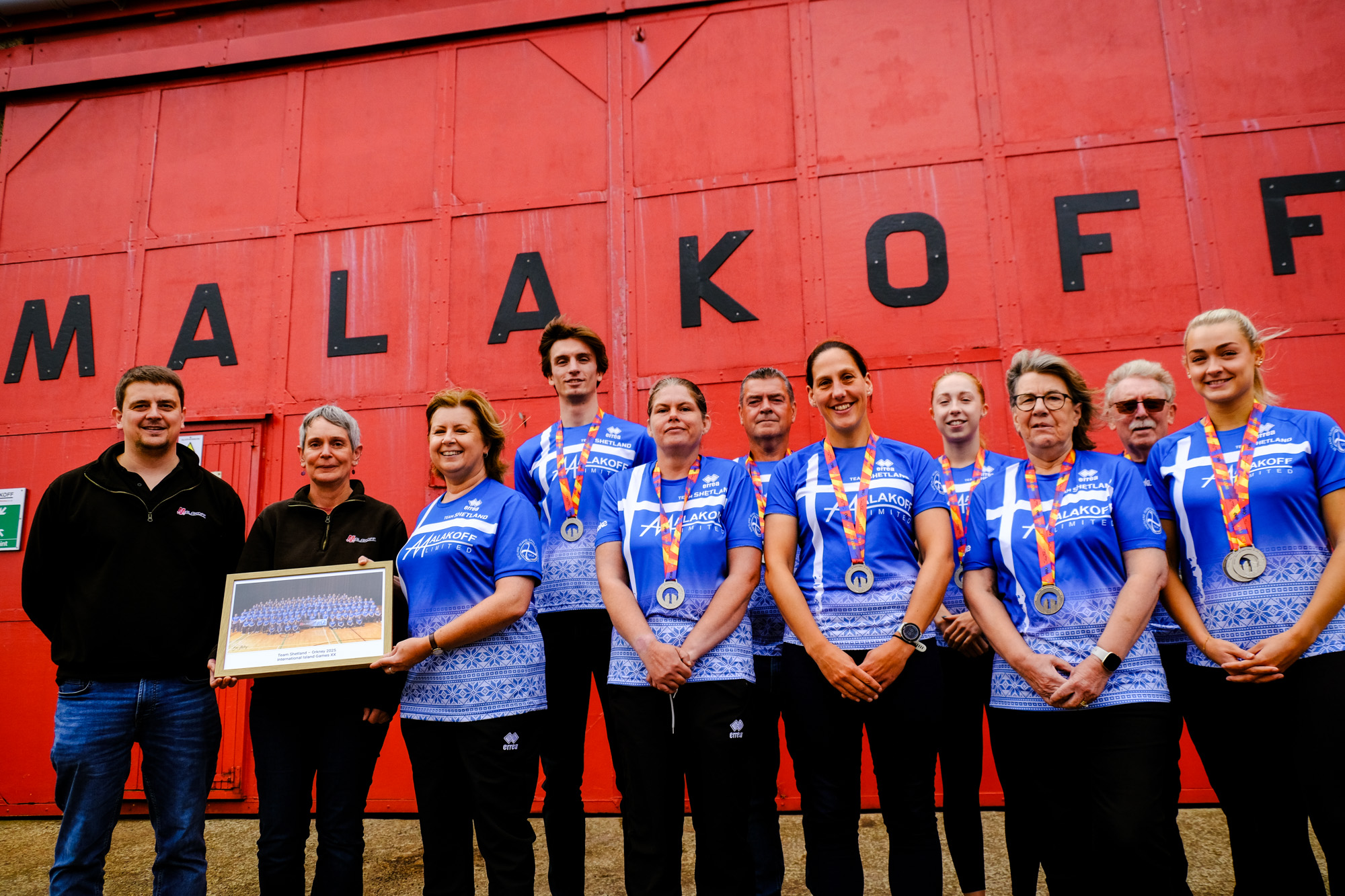 team-shetland-thanks-six-time-island-games-sponsors-malakoff-for-continued-support